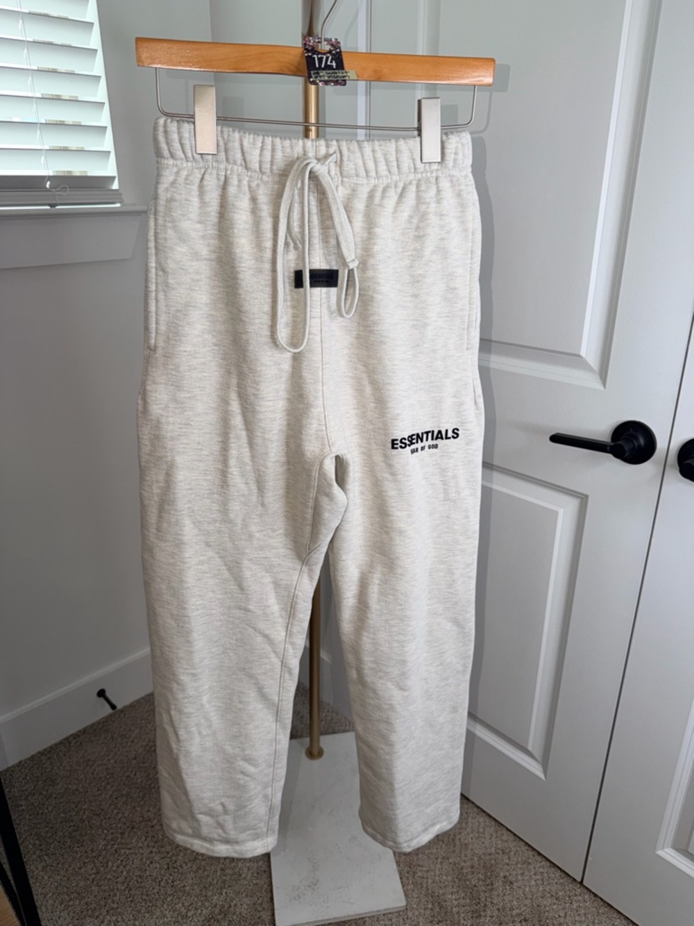 174. Fear of God Essentials Relaxed Sweat Pant in Light Oatmeal